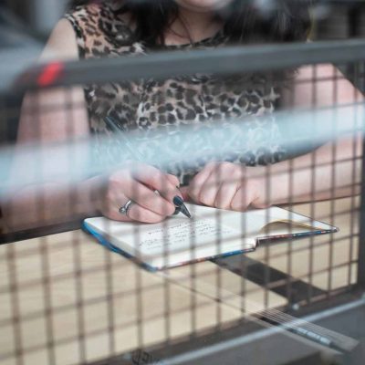 Alison takes client notes